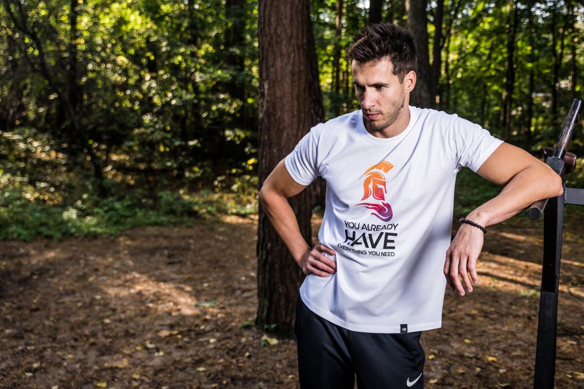 Five t-shirts with different necklines laid flat side by side, from crew to boat neck